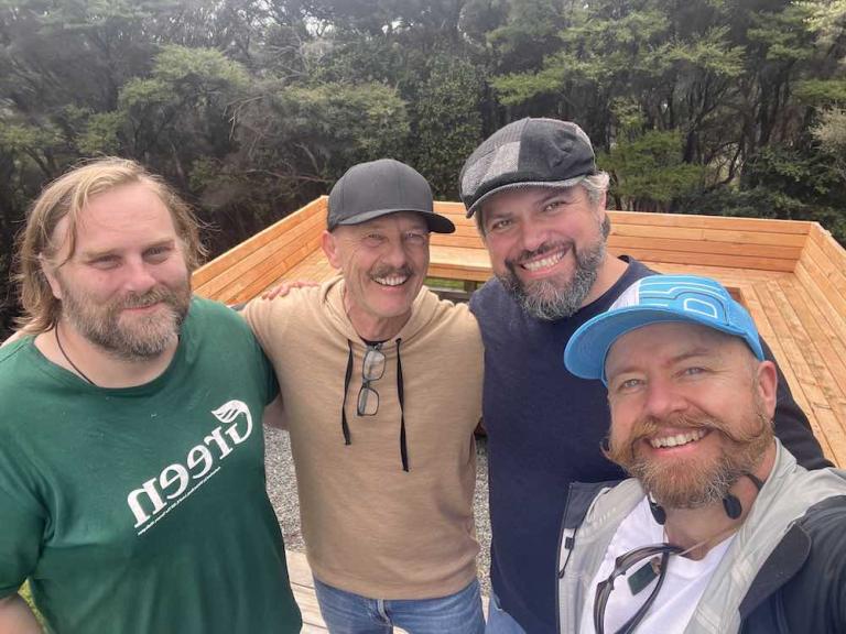 The Praxxis Group team, creators of OPAL3, pictured together outdoors in New Zealand.
